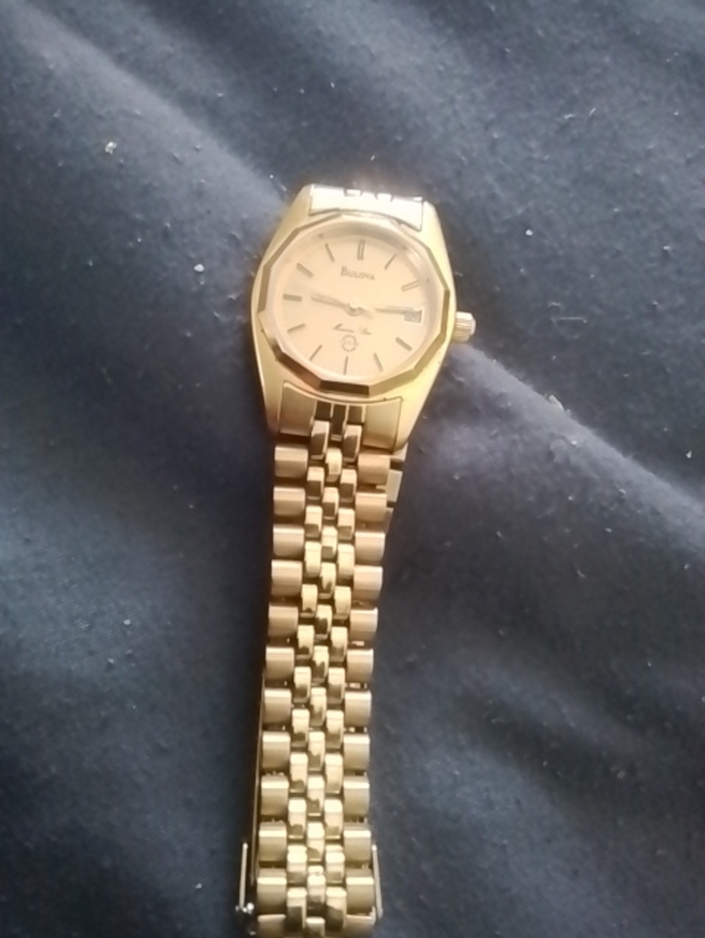Bulova Woman s Gold-Tone Fancy Boulova Watch